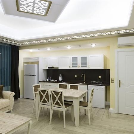 Merada Suit Otel 梅尔辛 外观 照片