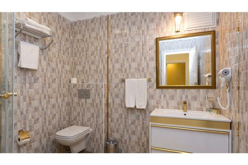 Merada Suit Otel 梅尔辛 外观 照片