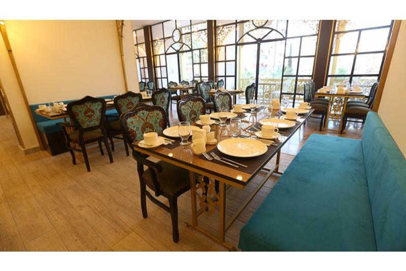 Merada Suit Otel 梅尔辛 外观 照片